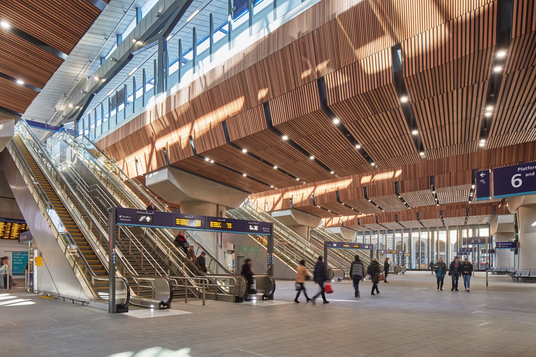 London Bridge Station interior with timber ceiling and escalators