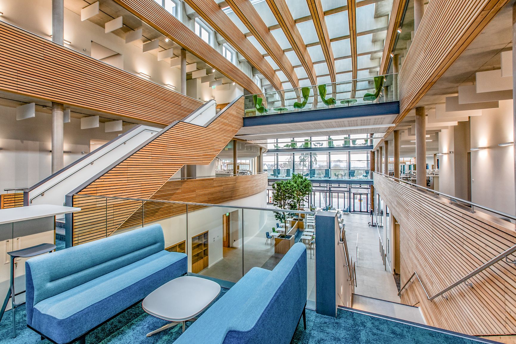 UK Hydrographic Office interior with exposed Siberian larch timber and bright atrium